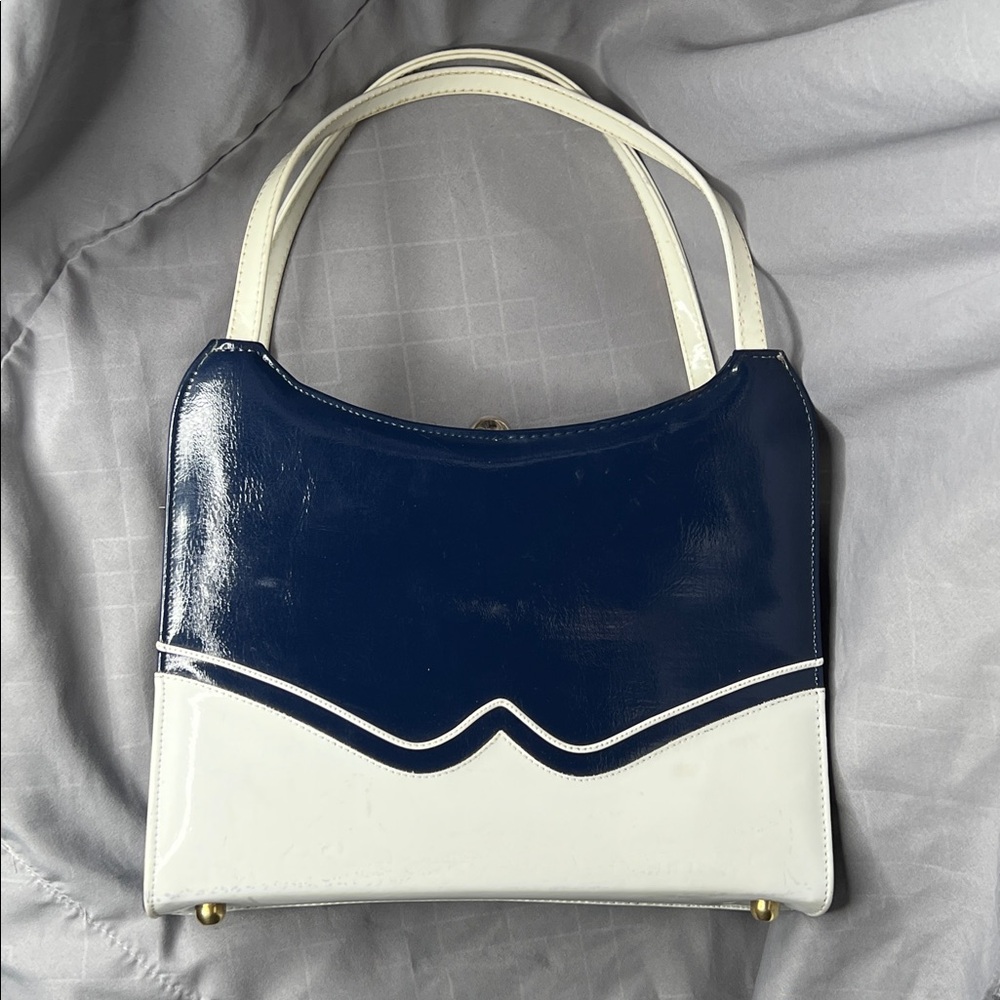 1960’s “RISQUÉ” SPECTATOR TOP-HANDLE NAVY & WHITE FAUX PATENT HANDBAG